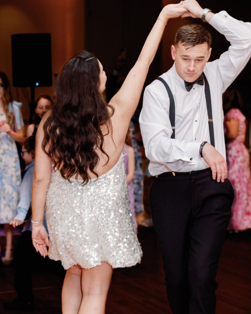 Bride and groom dancing at reception