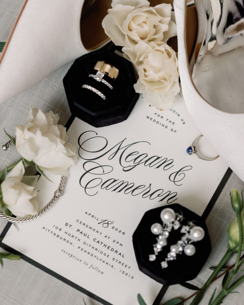Wedding details including shoes, jewelry, and invitation suite