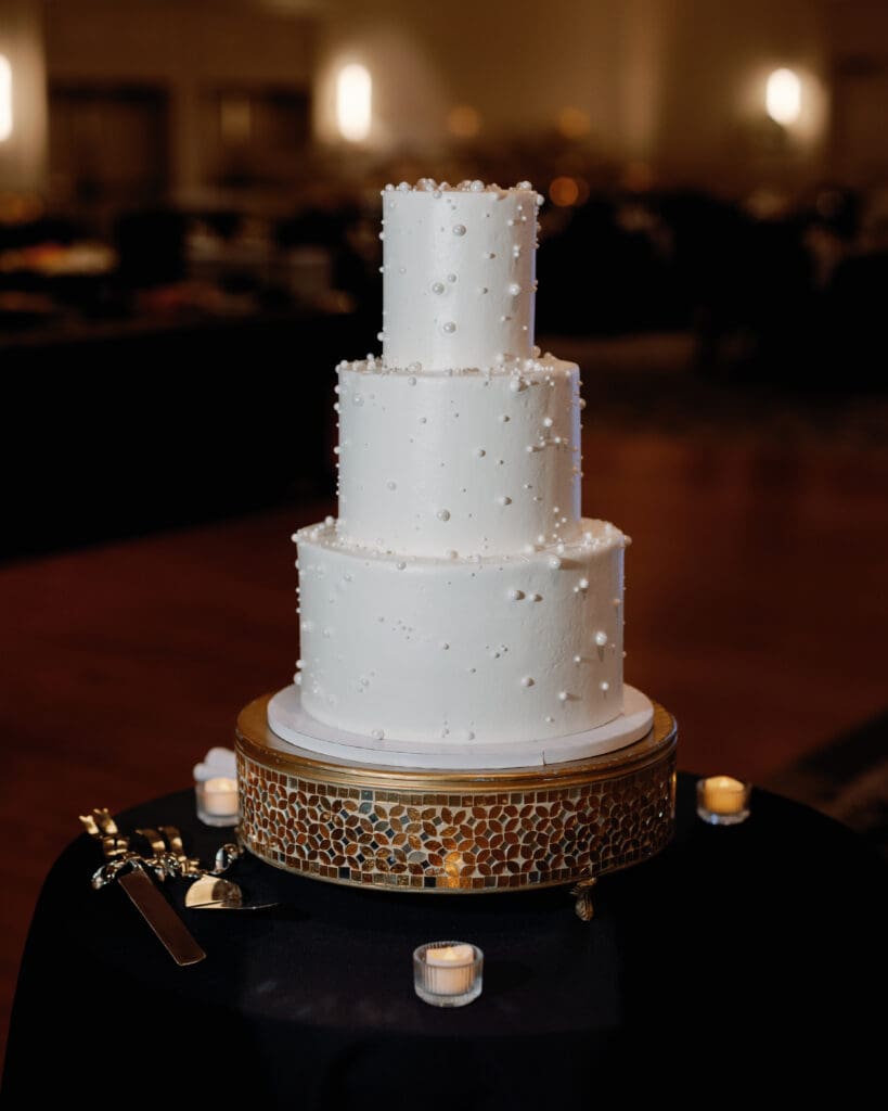 White wedding cake at reception Sheraton Station Square