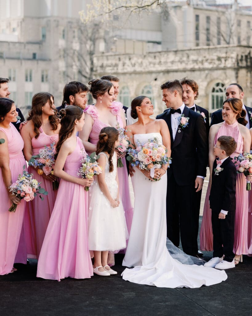 Bridal party group photo with bridesmaids in pink dresses at Pittsburgh wedding