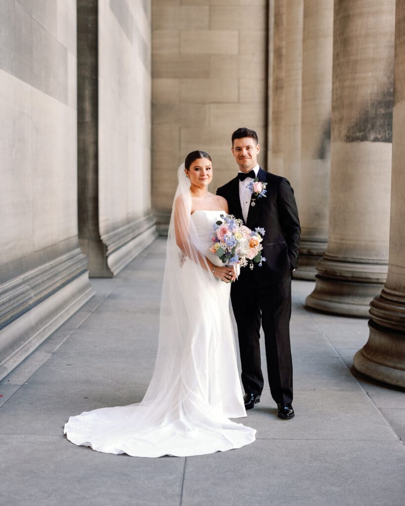 Bride and groom portrait at Mellon Institute Columns in Oakland Pittsburgh wedding