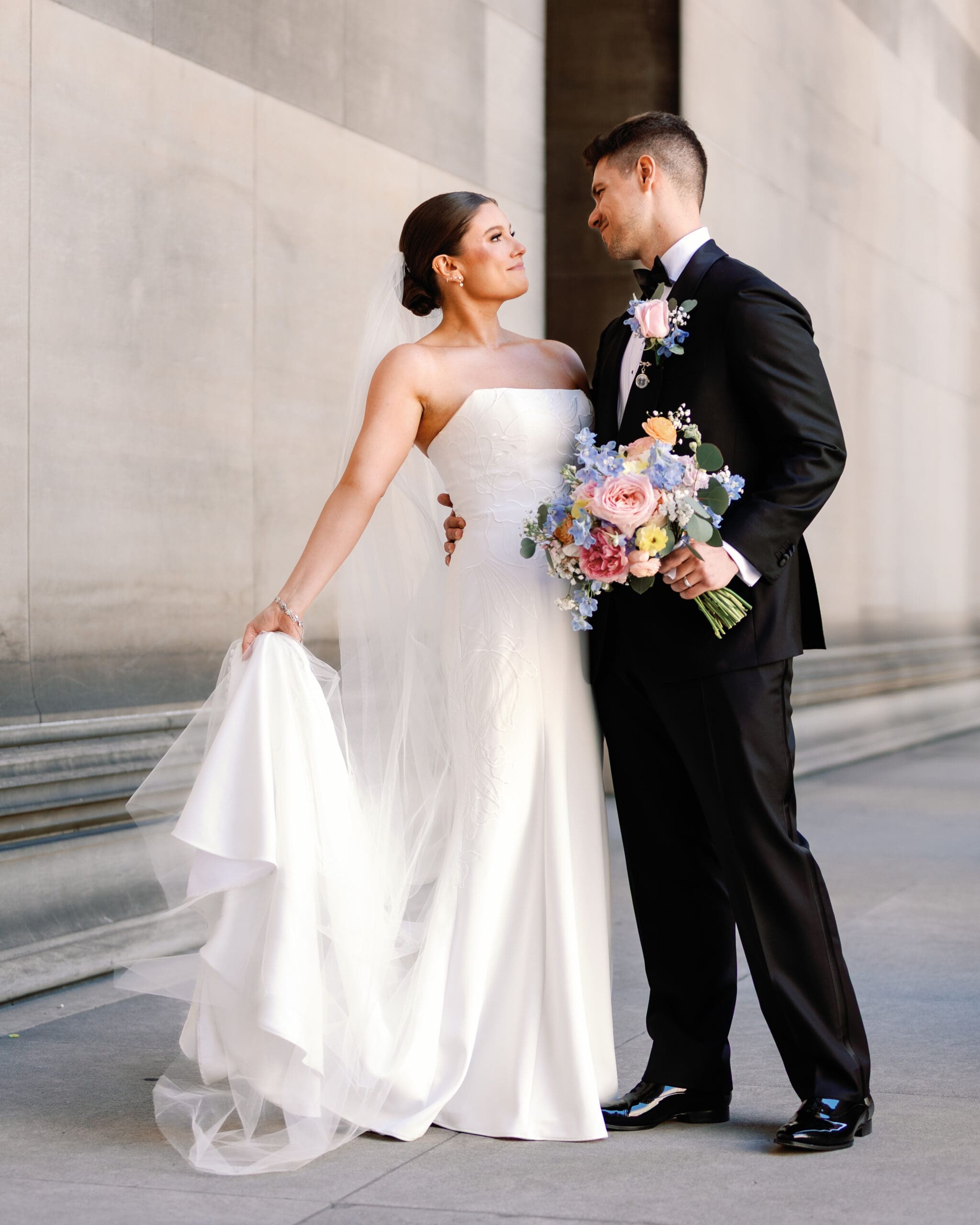 Bride and groom portrait at Mellon Institute Columns during Pittsburgh Renaissance Hotel wedding