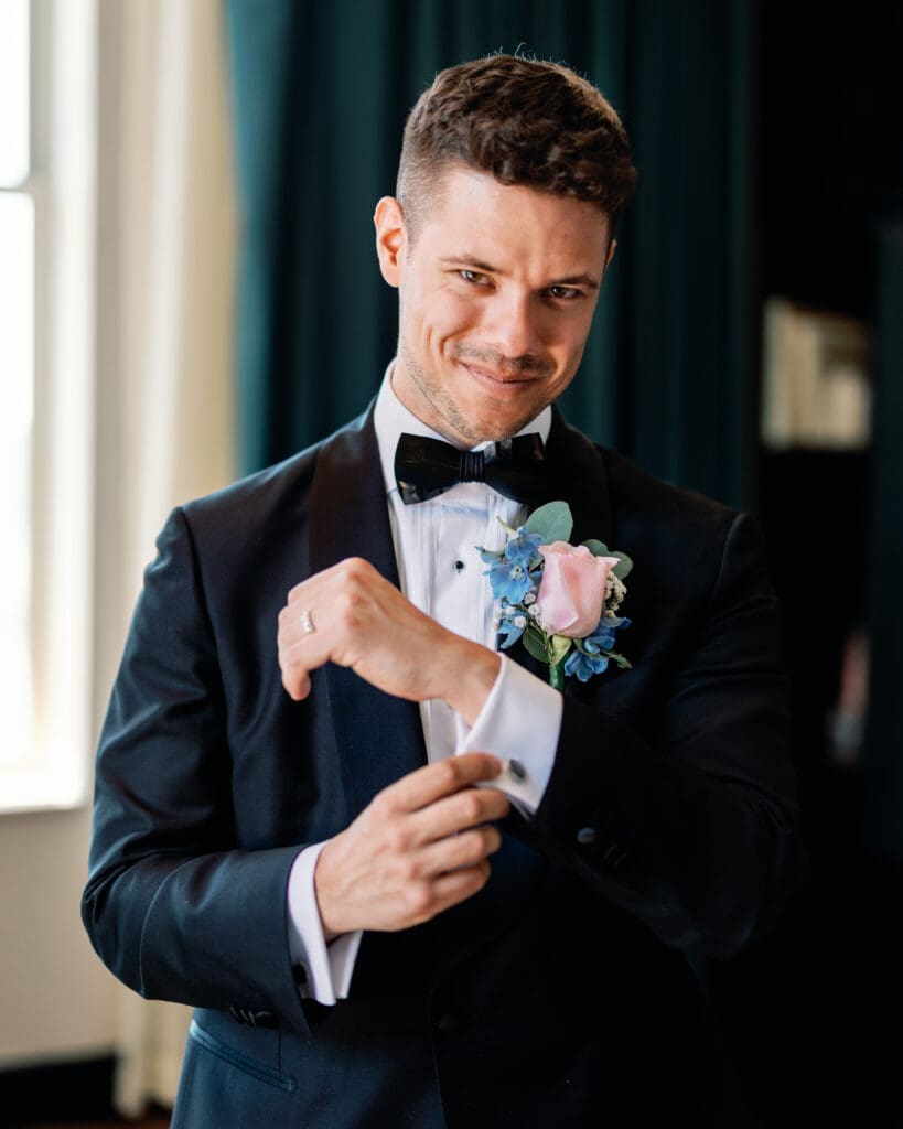 Bride and groom candid moment indoors at Pittsburgh Renaissance Hotel wedding reception space