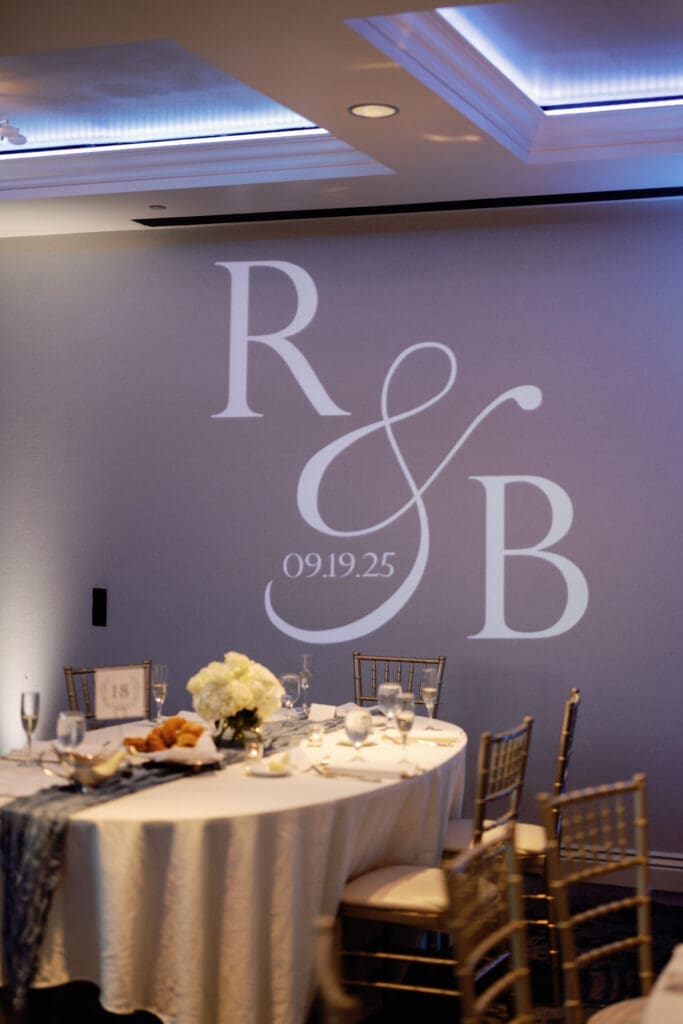 Custom wedding monogram projected on wall during Renaissance Hotel Pittsburgh reception