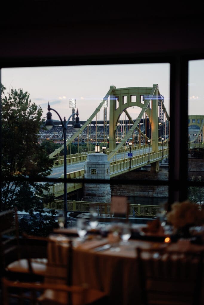View of yellow bridge through window at Renaissance Hotel Pittsburgh wedding reception