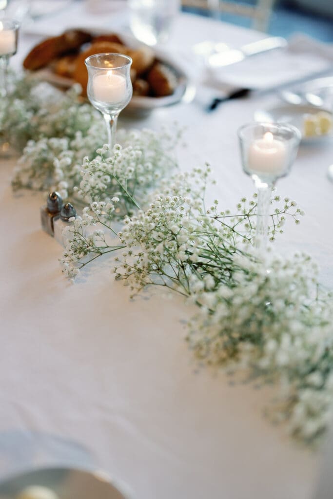 Reception table detail with candles and baby's breath at Renaissance Hotel Pittsburgh