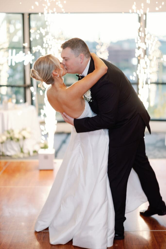 Bride and groom kissing with indoor sparkler effect at Renaissance Hotel Pittsburgh