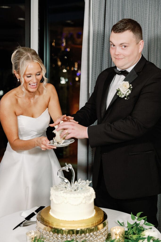 Bride and groom cutting cake together at Renaissance Hotel Pittsburgh reception